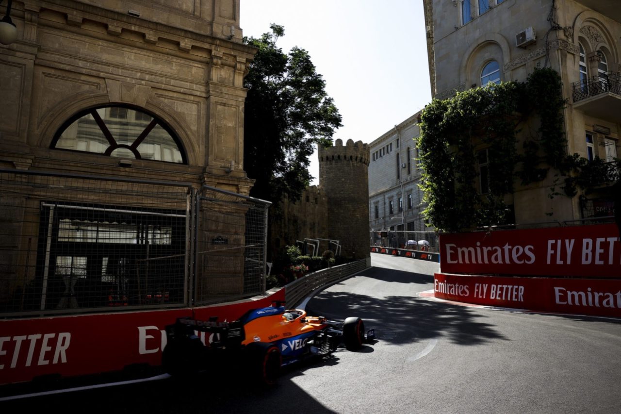 Daniel Ricciardo, McLaren MCL35M, threads through the narrow streets of Baku