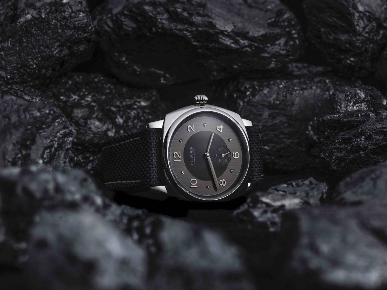 Fears Brunswick PT – Anthracite and Diamond dial on an Obsidian Black Kevlar strap – surrounded by Anthracite